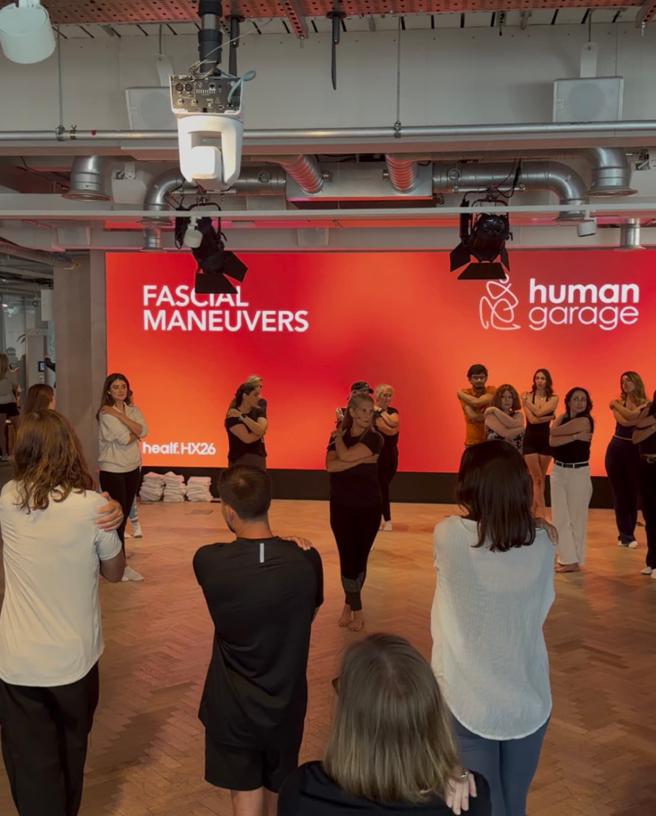 Carolyn Wade guiding a group through a body-based reset practice